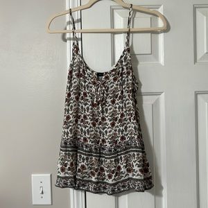 White floral tank top.